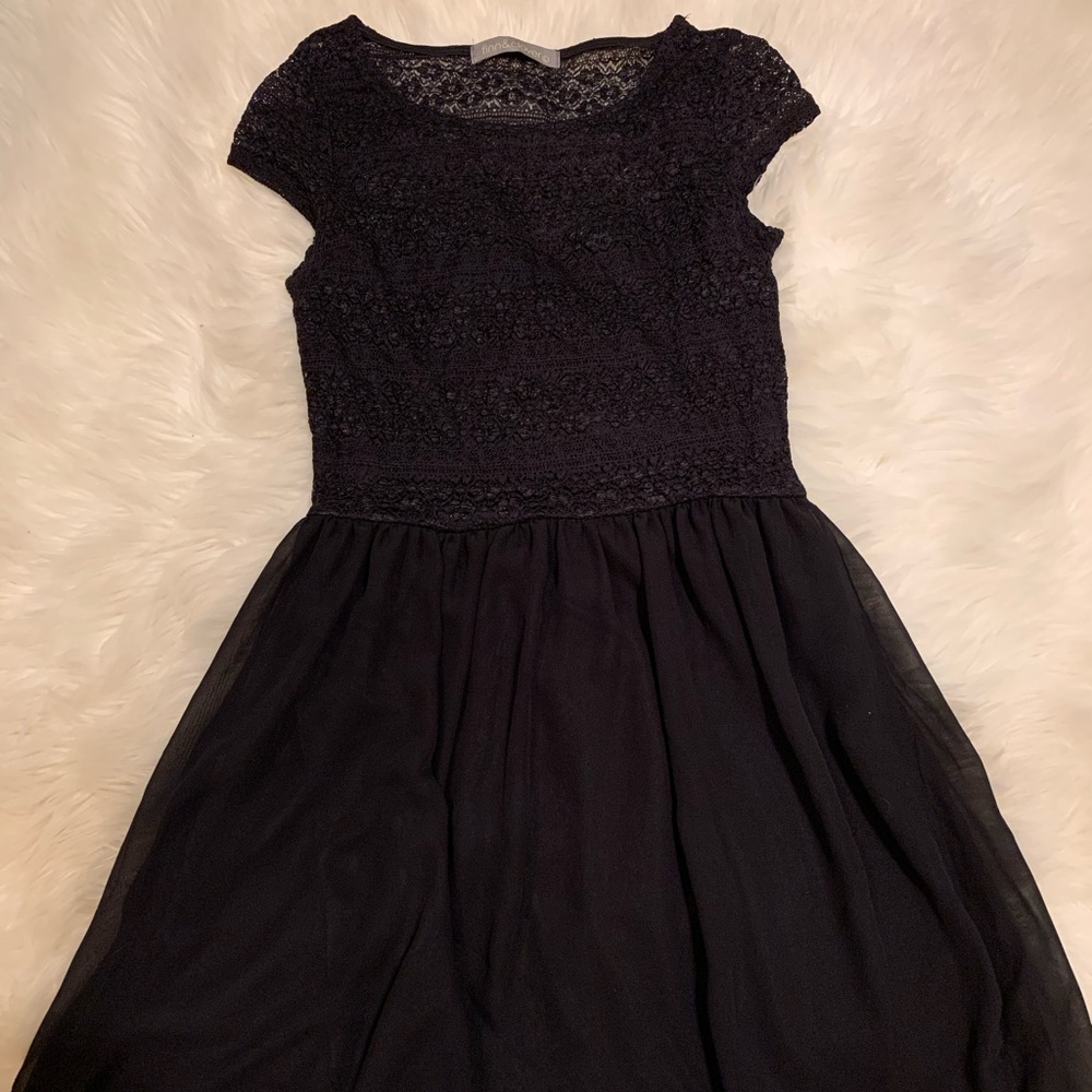 Black dress , goes alittle bit above the knees